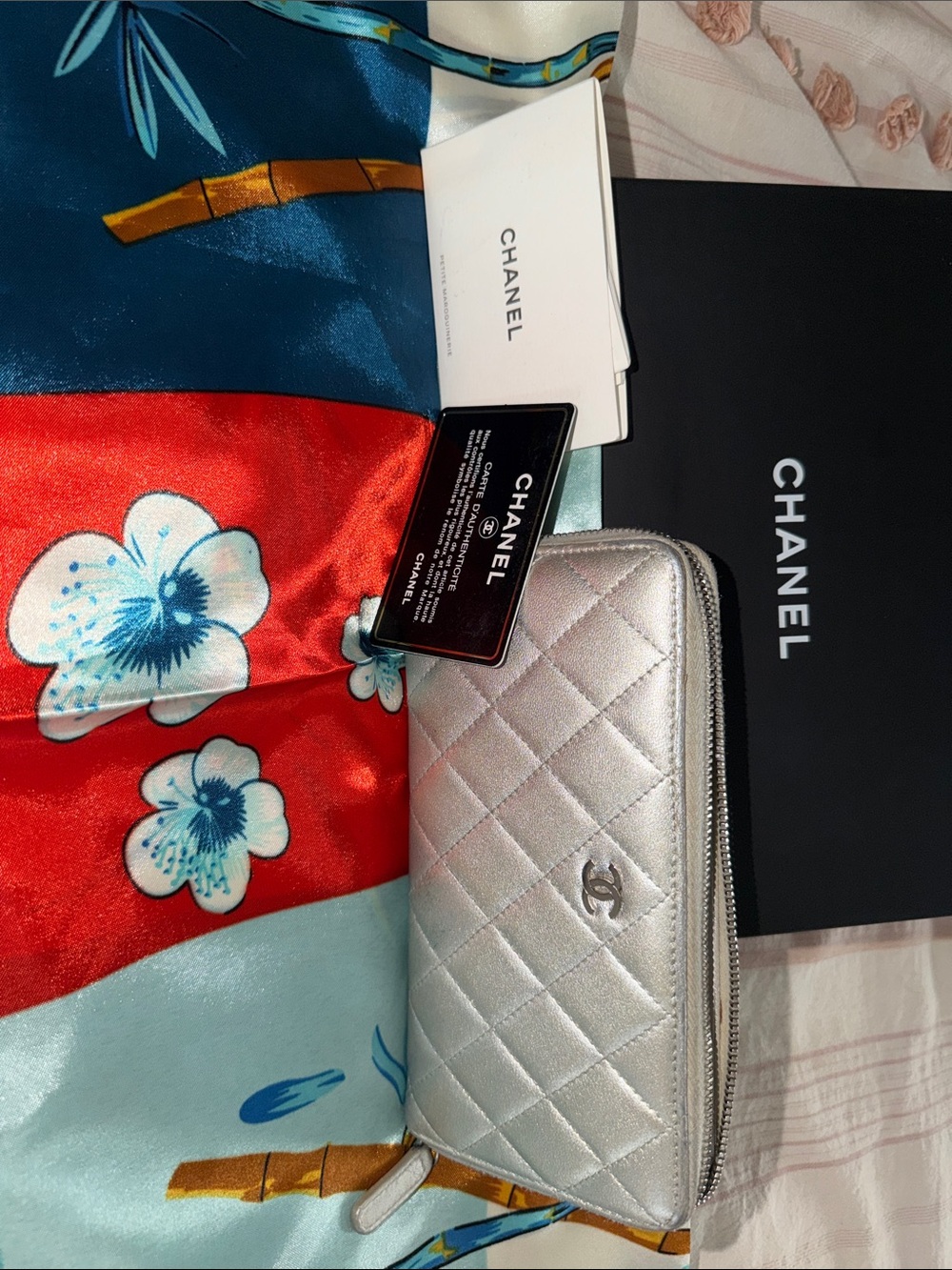 CHANEL Silver Quilted Zip Around Wallet